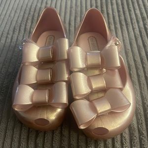 Rose gold mini Melissa’s worn once size 9